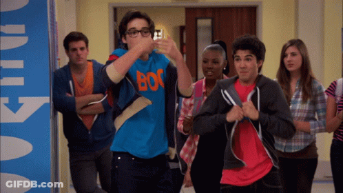 A Boy Wearing A Blue Shirt That Says Boc GIF