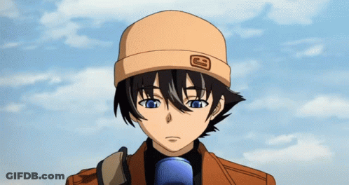 A Boy Wearing A Hat With The Letter G On It Looks At The Camera GIF