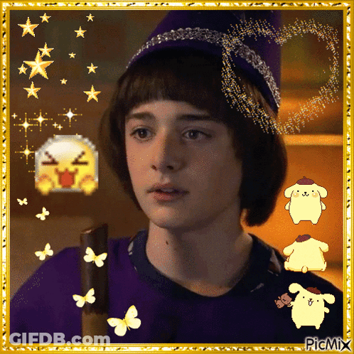 A Boy Wearing A Purple Hat And A Purple Shirt Is Surrounded By Pompompurins And Butterflies GIF
