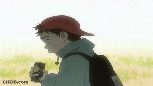 A Boy Wearing A Red Hat Holds A Can Of Soda In His Hand GIF