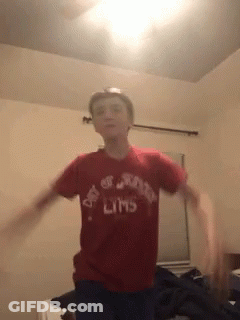 A Boy Wearing A Red Shirt That Says Day Of The Limbs On It GIF