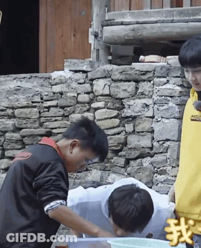 A Boy Wearing A Yellow Sweatshirt That Says ' Supreme ' On It Stands Next To A Boy In A Black Jacket GIF
