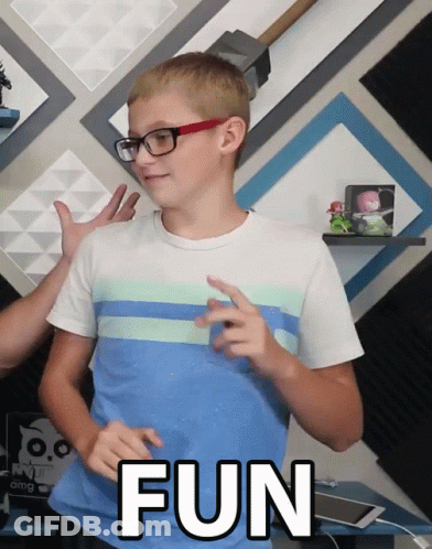 A Boy Wearing Glasses And A Blue Shirt With The Word Fun Written On It GIF