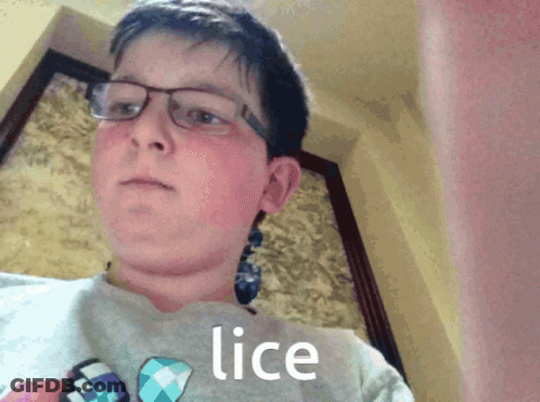 A Boy Wearing Glasses And A Shirt With Lice On It GIF