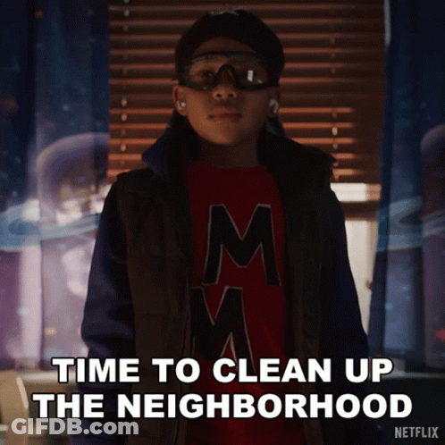 A Boy Wearing Goggles And A Red Shirt With The Letter M On It Says Time To Clean Up The Neighborhood GIF