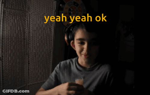 A Boy Wearing Headphones Says " Yeah Yeah Ok " GIF