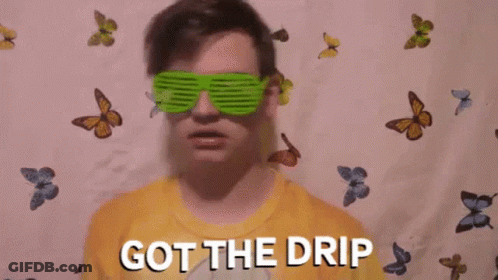 A Boy Wearing Sunglasses And A Yellow Shirt With The Words Got The Drip Written On It GIF