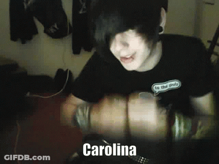 A Boy With A Black Shirt That Says To The Pub GIF