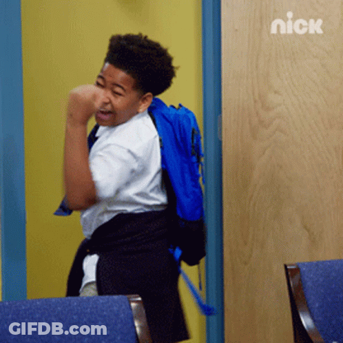 A Boy With A Blue Backpack Is Standing In Front Of A Door With The Nick Logo On It GIF