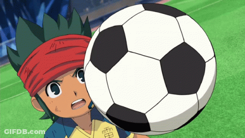 A Boy With A Red Headband Is Holding A Soccer Ball With The Letter H On It GIF