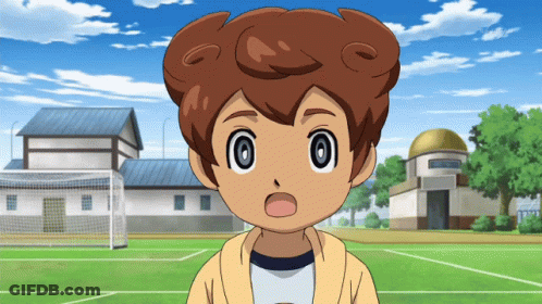 A Boy With A Surprised Look On His Face Stands In Front Of A Soccer Field GIF