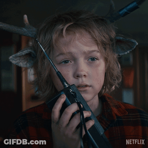 A Boy With Antlers On His Head Is Holding A Walkie Talkie And The Words It 'S Done Are Above Him GIF
