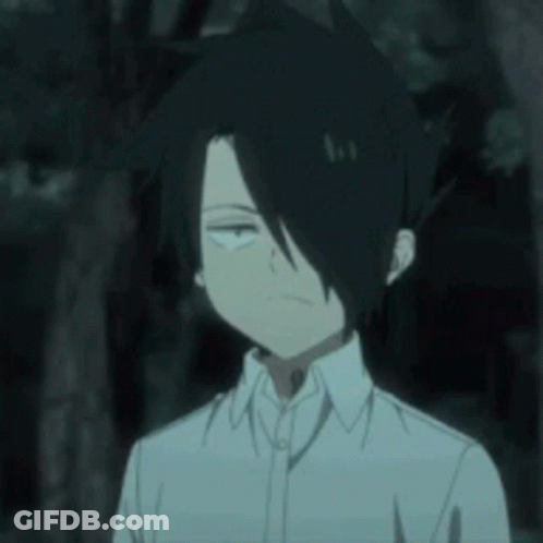 A Boy With Black Hair And A White Shirt Is Making A Funny Face . GIF