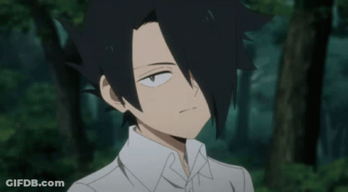 A Boy With Black Hair And A White Shirt Is Smiling And Waving His Hand GIF