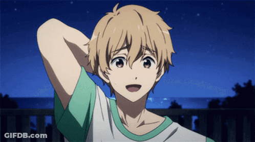 A Boy With Blonde Hair And A Green And White Shirt Is Smiling GIF
