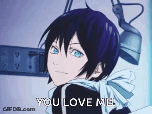 A Boy With Blue Eyes Is Saying `` You Love Me '' While Standing In Front Of A Microphone . GIF