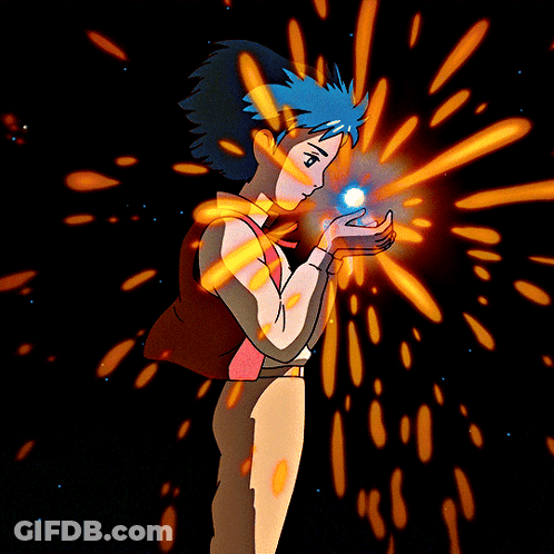 A Boy With Blue Hair Is Holding Something In His Hands GIF