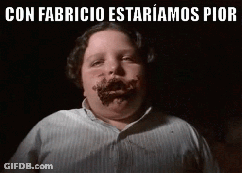 A Boy With Chocolate On His Face And The Words `` Con Fabricio Estariamos Pior '' Above Him . GIF
