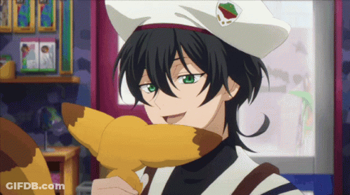 A Boy With Green Eyes And A White Hat Is Holding A Stuffed Animal In Front Of His Face GIF