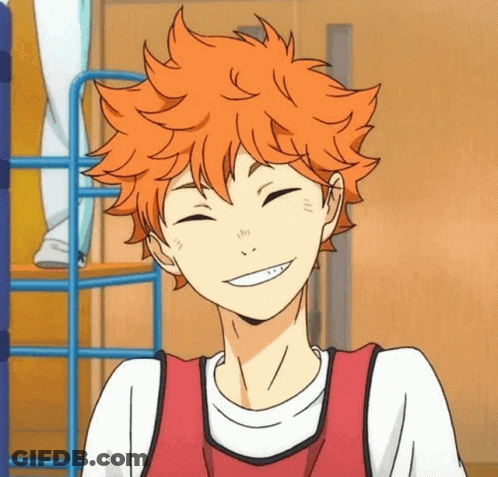 A Boy With Orange Hair Is Smiling With His Eyes Closed And His Mouth Open . GIF