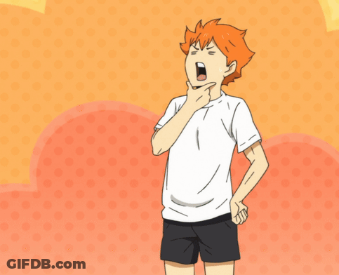 A Boy With Orange Hair Is Wearing A White T-Shirt And Black Shorts GIF
