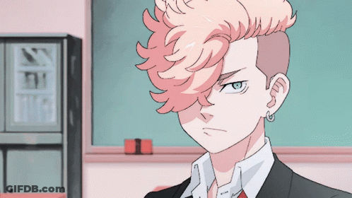 A Boy With Pink Hair And Blue Eyes Is Wearing A Suit GIF