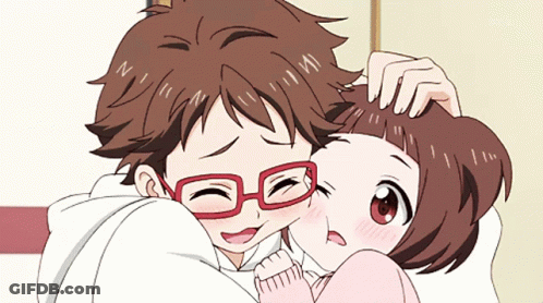 A Boy With Red Glasses Is Hugging A Girl With Brown Hair GIF