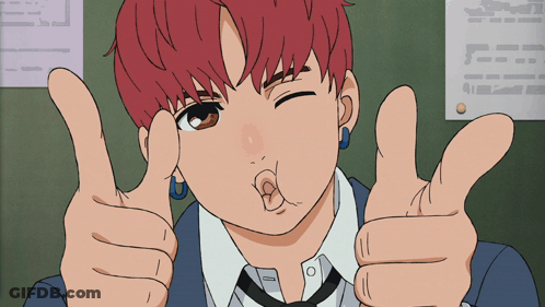A Boy With Red Hair Is Giving A Thumbs Up Sign GIF