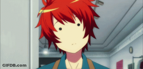 A Boy With Red Hair Is Making A Face GIF