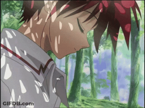 A Boy With Red Hair Is Sleeping In A Forest GIF