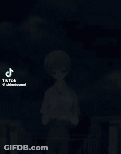 A Boy With Short Brown Hair Is Standing In Front Of A Blue Sky With Tiktok Written On The Bottom GIF