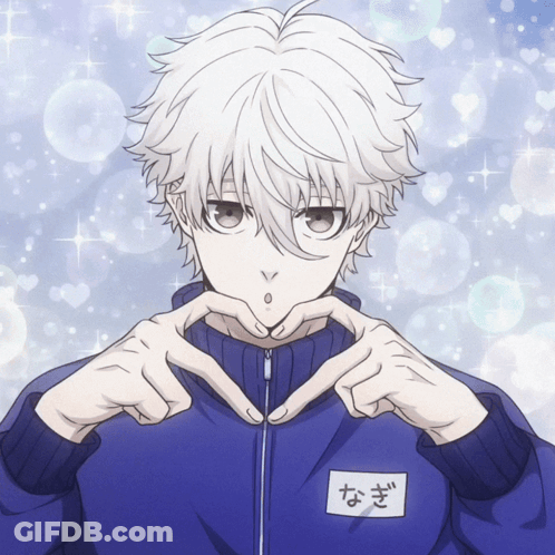 A Boy With White Hair And A Name Tag That Says ' N ' On It Makes A Heart Shape With His Hands GIF