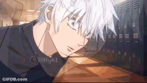 A Boy With White Hair Is Sitting In A Locker Room . GIF
