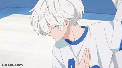 A Boy With White Hair Is Wearing A Blue And White Shirt With The Letter M On It GIF