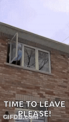 A Brick Building With A Window That Is Open And Says `` Time To Leave Please '' . GIF