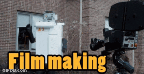 A Brick Building With The Words Film Making On It GIF