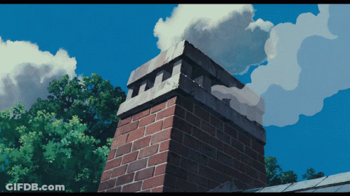 A Brick Chimney With A Blue Sky In The Background GIF