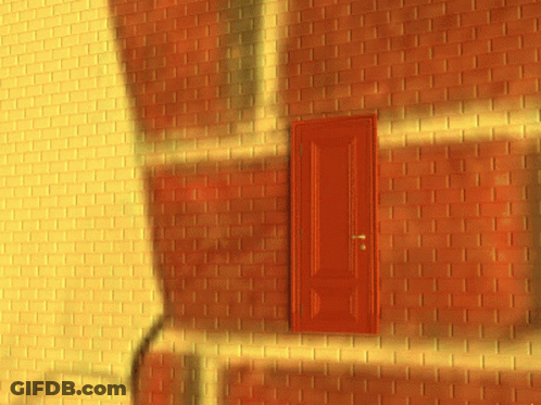 A Brick Wall With A Red Door In It GIF