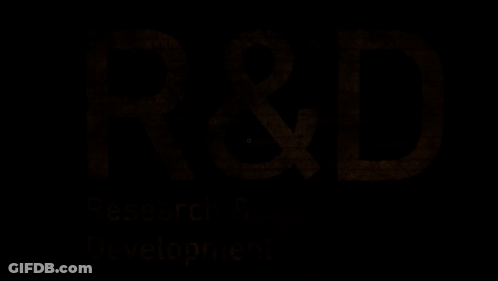 A Brick Wall With The Words Research & Development Written On It GIF