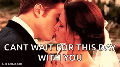 A Bride And Groom Kissing With The Words `` Cant Wait For This Day With You '' Written Below Them . GIF