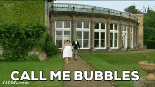 A Bride And Groom Walking Down A Path With The Words Call Me Bubbles GIF