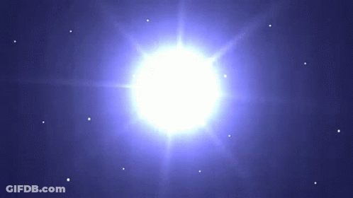 A Bright White Star Is Surrounded By Smaller Stars In A Blue Sky GIF