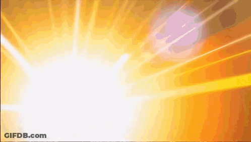 A Bright Yellow And Orange Background With A White Glowing Object In The Middle GIF