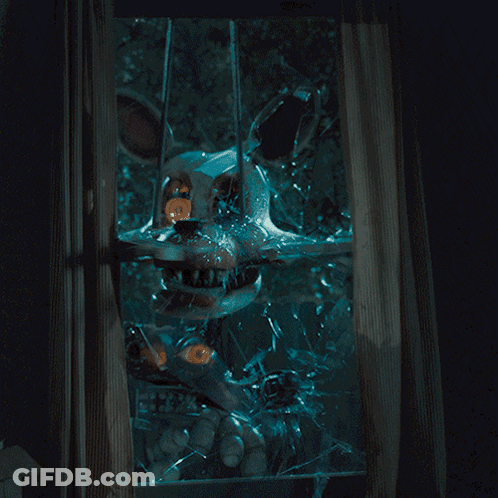 A Broken Glass Window With A Cartoon Character Behind It GIF