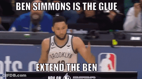 A Brooklyn Nets Basketball Player Is Sitting In Front Of A Computer Screen GIF