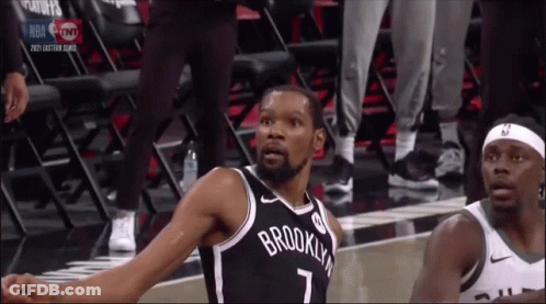 A Brooklyn Nets Player Stands On The Court GIF