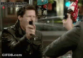 A Brooklyn Nine-Nine Advertisement With Two Men GIF
