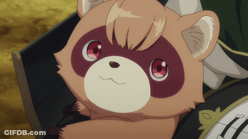 A Brown And White Animal With Red Eyes Is Sitting On A Table GIF