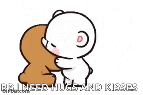 A Brown And White Teddy Bear Kissing Each Other On The Cheek . GIF