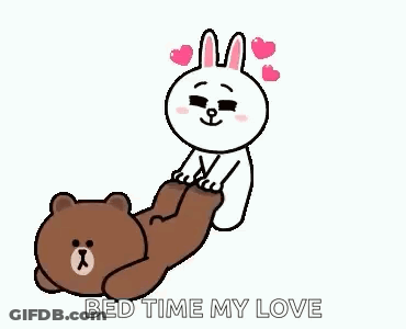 A Brown Bear And A White Rabbit Are Laying On Each Other . GIF